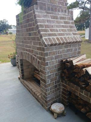 A outdoor fireplace built by FyreMason.. Corpus cristi TX.