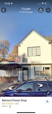 Storefront boarded up windows