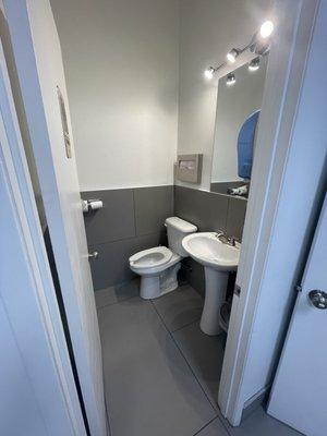 Access to a bathroom on laundromat side