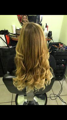 Blond hair extensions with curls