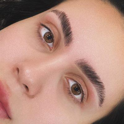 Eyebrow lamination, shaping and tint.