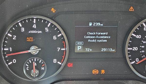 After they fixed the windshield washer fluid, there were five warning lights on the dashboard.