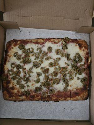 Gluten-free crust, small pizza with the most amazing green olives.