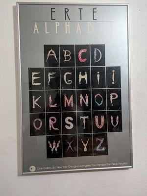 Erte alphabet with custom poster frames by Guadalupe frame Crafters Inc. Santa Fe, New Mexico