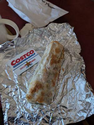 Tiny $18 "ultimate" burrito. Costco card for size reference.