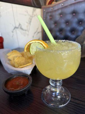 Medium sized Lime Margarita with sugar on the rim, salsa and chips at no extra charge and delivered to table upon seating.