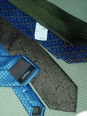 Four men's ties for $16...Dept Store sticker total? $238. I think the Rugged total is roughly the tax on Dept Store sticker