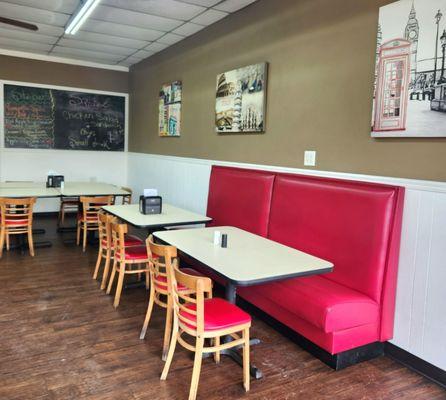 Specials board towards the back. Starbucks drinks are available for purchase.