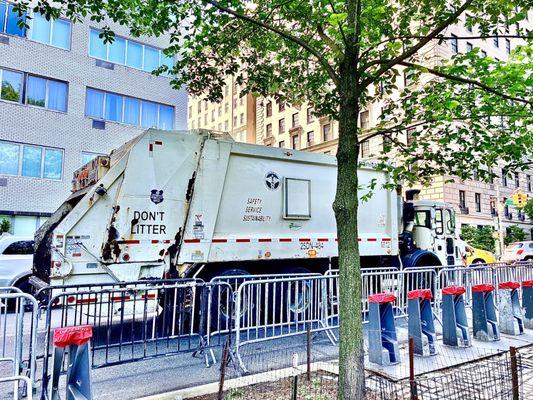 I asked a police officer why the trucks on parade route. They're going to block vehicles entering from side streets. 06/04/23