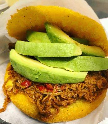 Shredded beef arepas with avocado