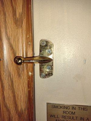 The deadlock on the door.