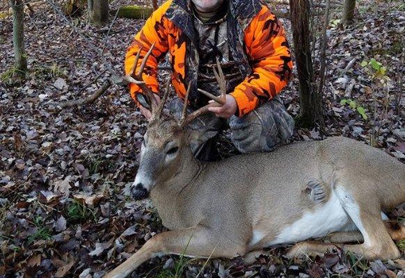 The only picture I have of my first big buck. No mount and out $150.