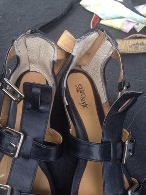 Asymmetrical repair job done two weeks late within 20 minutes of my phone call. Appalling frankenshoes.