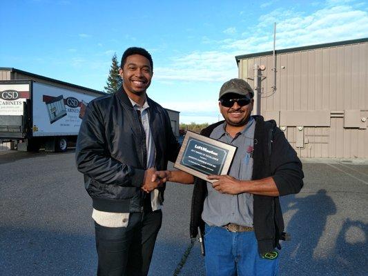 Our technician receiving an award from Liftmaster.