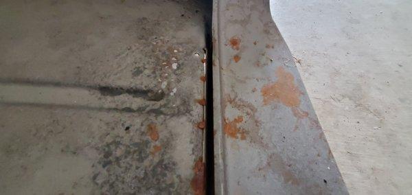 Passenger side rocker panels not lined up with floor and bad welds.