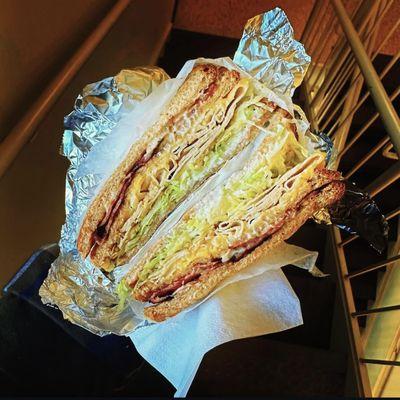 Turkey club on wheat