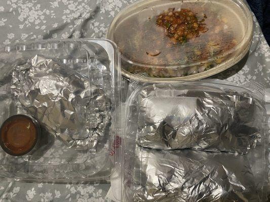 Steak street tacos, barbacoa and steak tacos and burrito bowl. Remote for size.