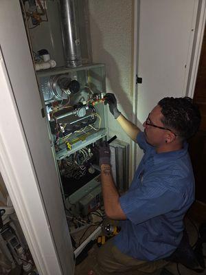 HVAC Kaiser Air Conditioning Contractor working on unit