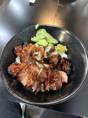 Pork rib bowl- tender pork, rice, cucumbers, relish and delicious teriyaki sauce.