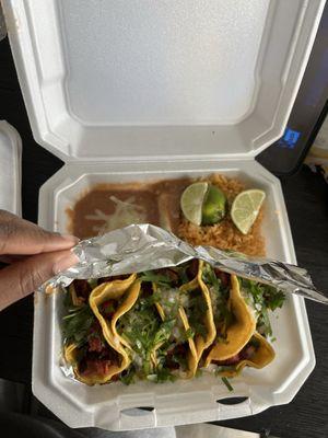 5 al pastor taco plate with rice and beans