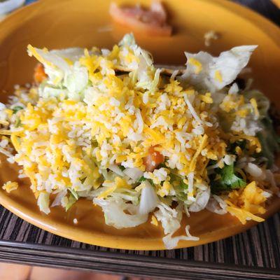 Picadillo Hard Taco, loaded with cheese.