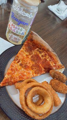 Pepperoni pizza, onions rings and Stuffed Jalapeno Peppers
