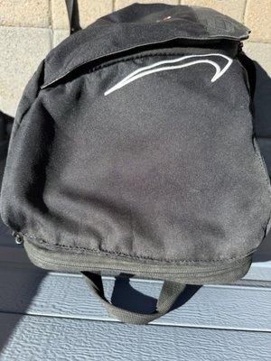 Backpack sewn pocket