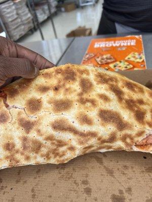 Returned uncut thin crust pizza that the staff asked me, "what is wrong with it?" She said looking at the pizza.