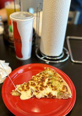 Chicken bacon pesto slice. Look at that gooey cheese. 