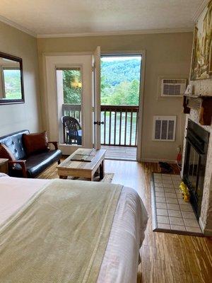 Room 209. Second floor with one bed and a fireplace.