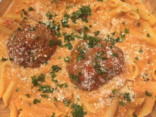 Penne vodka cream, Parmesan, pancetta and tomatoes with a side of our homemade meatballs