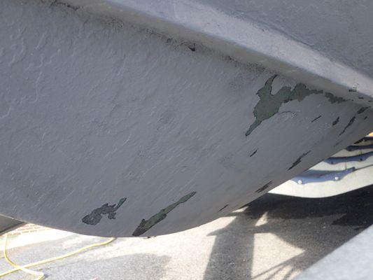 This is a 800.00 bottom paint job from JJ boat works after the first run on a lake. And they won't call me about this!!!!