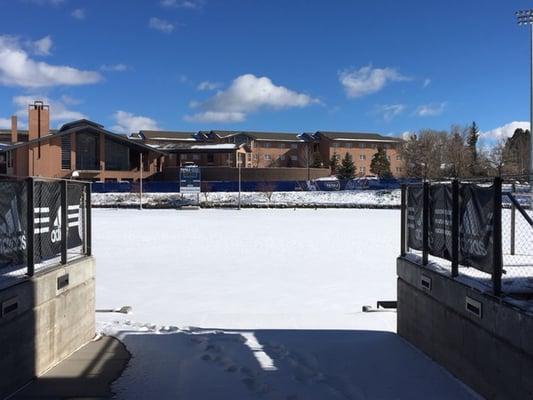The track/soccer field after a December 14, 2015 snowfall.