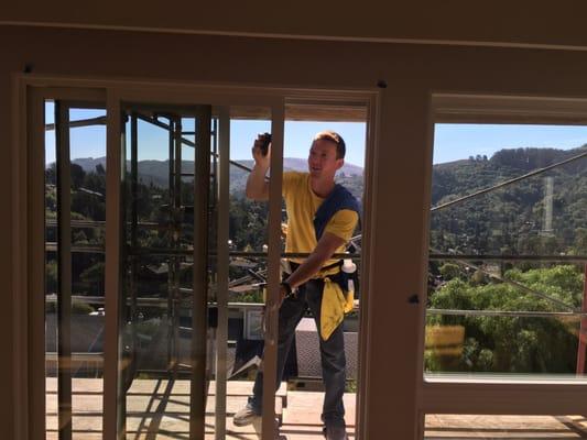 Cleaning on scaffolding during construction.