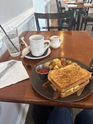 Los Brothers sandwich potatoes, bacon toast chorizo salsa