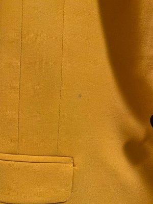 I got my suit back. Wet! It was suppose to be dried cleaned. Some mysterious green spot in many places.