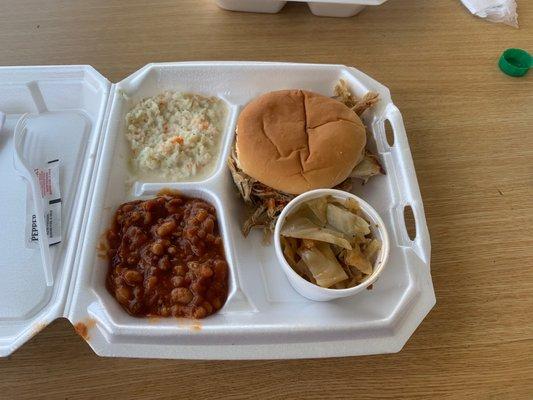 Pulled chicken sandwich, slaw, beans & grilled cabbage.