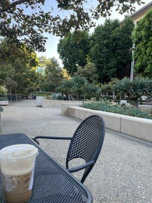 Nice area with tons of tables and chairs right outside the building