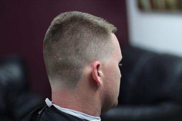 Faded temple and neck, short sides with some length on top.