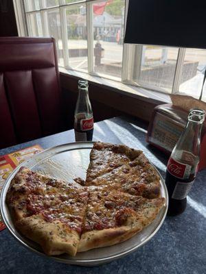 "Spicoli"- (cheese pizza) New York style hand-tossed pizza with cheese, pizza sauce, and herbs.