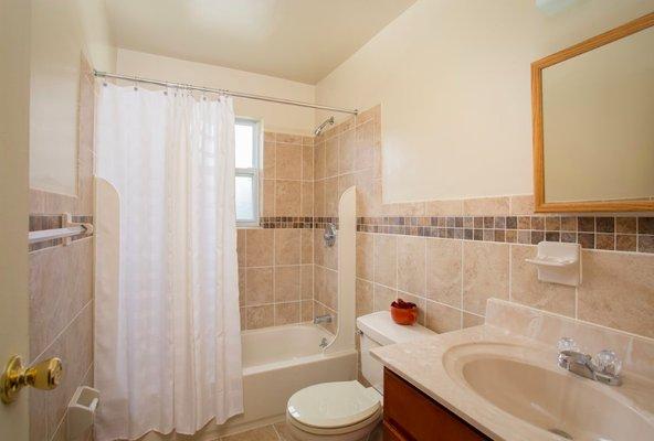 Beautifully tiled full bath for luxury relaxation.