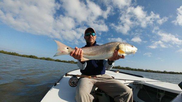 Happy client with a big redfish.
