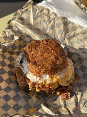 The Fav! Homemade biscuit with homemade "smasher" sausage, egg, home made hash brown, bacon jam and an egg. Hope you're hungry!