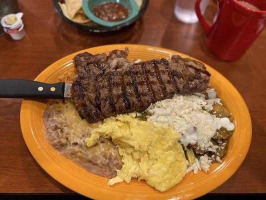 Green Chili Chilaquiles, scrambled eggs &  Steak