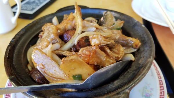 Sizzling fish clay pot