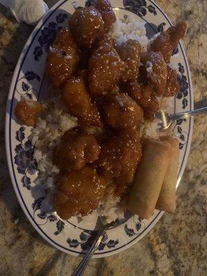 Orange chicken over rice and egg rolls. Super yummy.