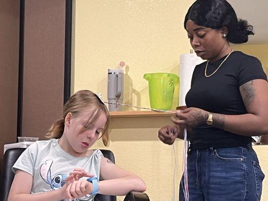 Getting the hair wrap and texting Daddy.