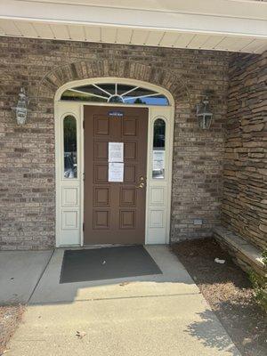 The suite has two doors, please use this door for entry. It is the one on the far right.