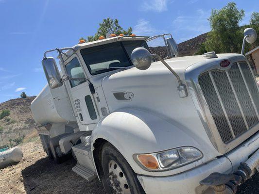 Construction site Water truck getting ready to go to grading to build new houses