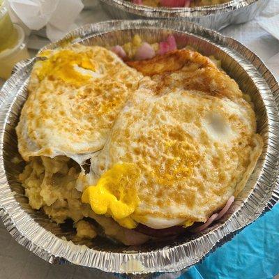 Two hit with mangú...fried eggs, fried cheese and fried salami